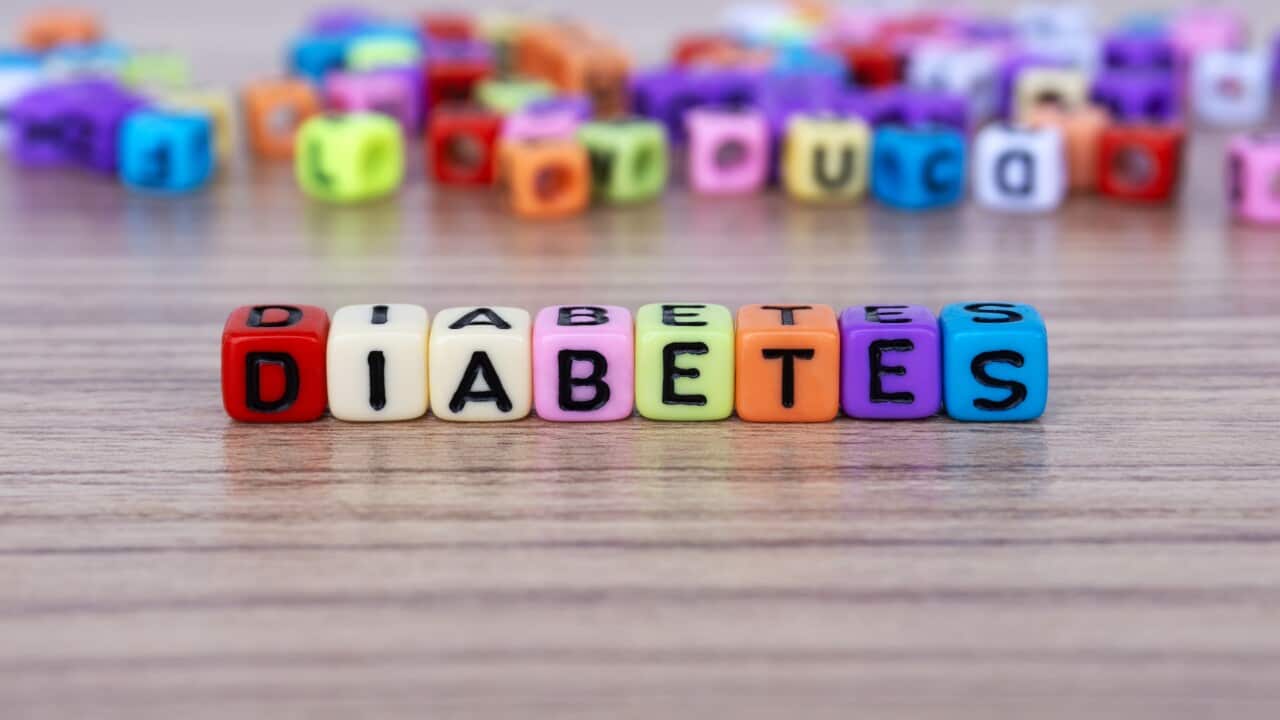 Diabetes Word on Colorful Plastic Wood - Healthcare and Medical Concept
