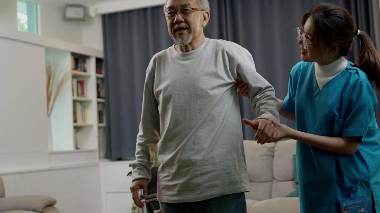 asian-senior-elderly-man-patient-doing-physical-therapy-with-caregiver-woman-nurse-hel-SBI-350524680.jpg