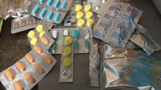 Different kinds of Paracetamol medicines displayed on a table