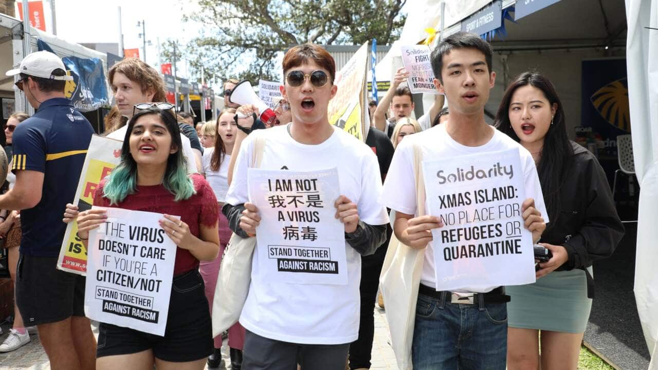 People rally in Sydney on 19 February over the Australian government’s coronavirus strategy and against the travel ban on Chinese visitors.