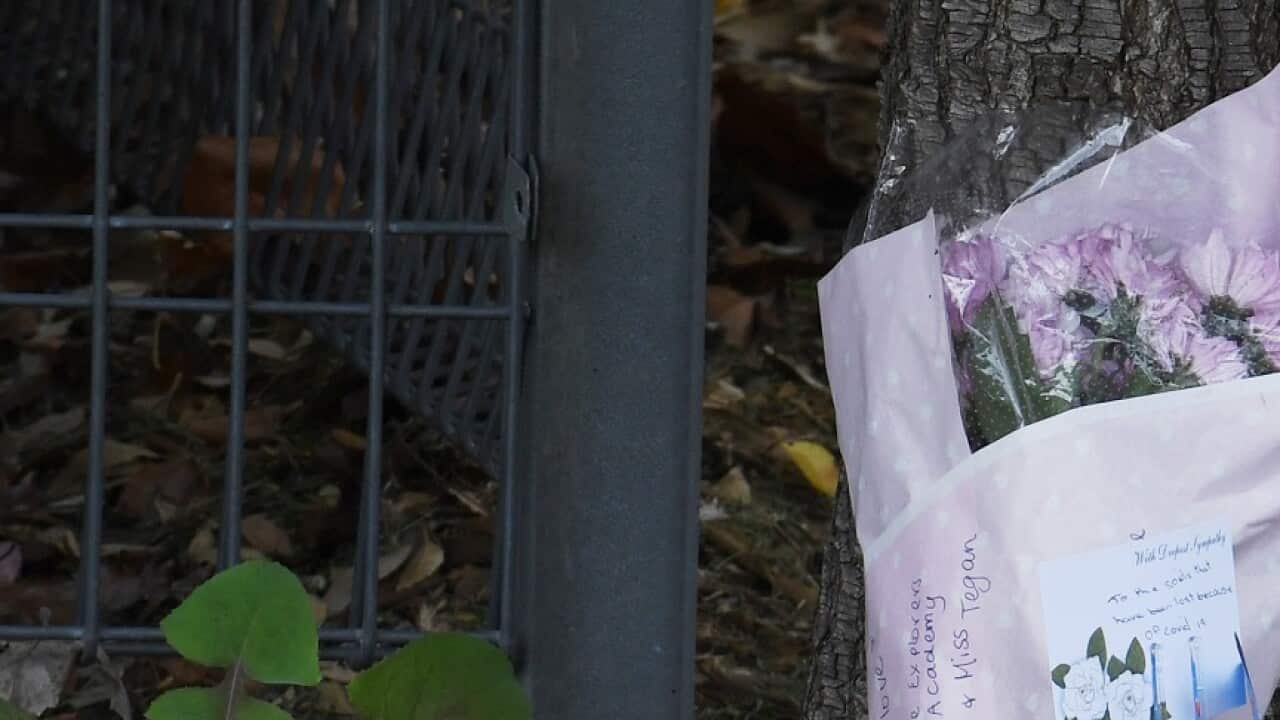 Flowers are seen left at the entrance to Anglicare Newmarch House agedcare home in Kingswood, near Penrith, NSW.