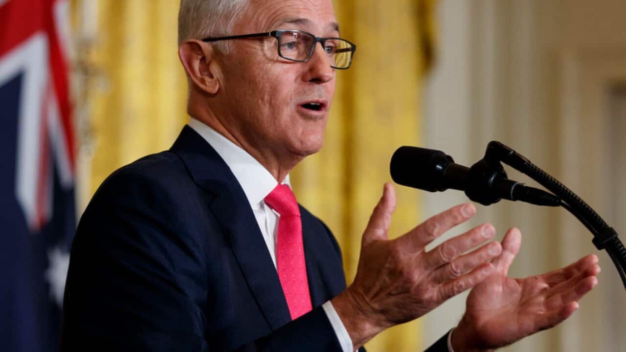 Australian Prime Minister Malcolm Turnbull speaks during a news conference with President Donald Trump in the East Room of the Washington.