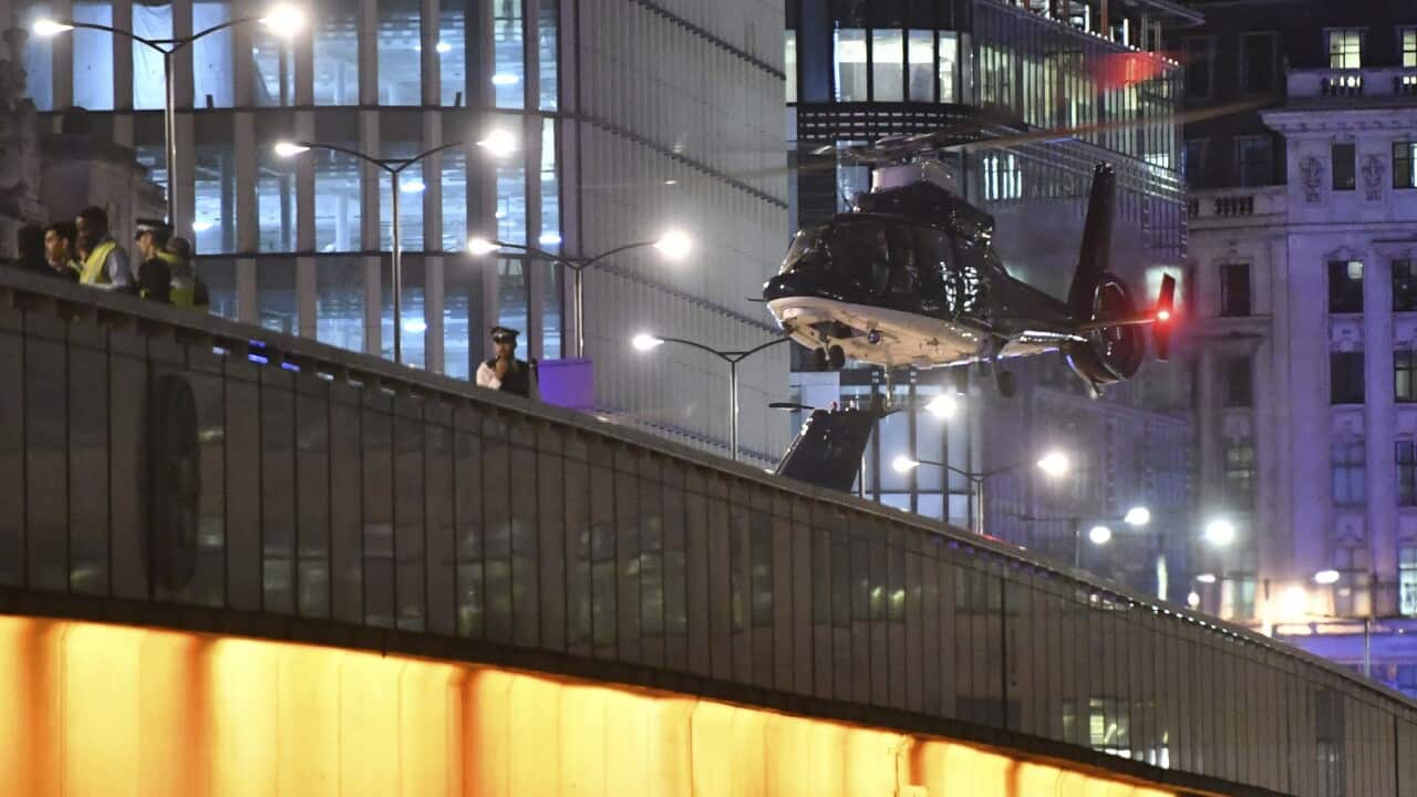 A helicopter lands on London Bridge after an attack in central London.