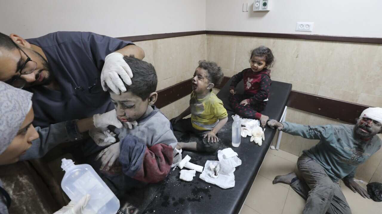 treating children at Aqsa Hospital