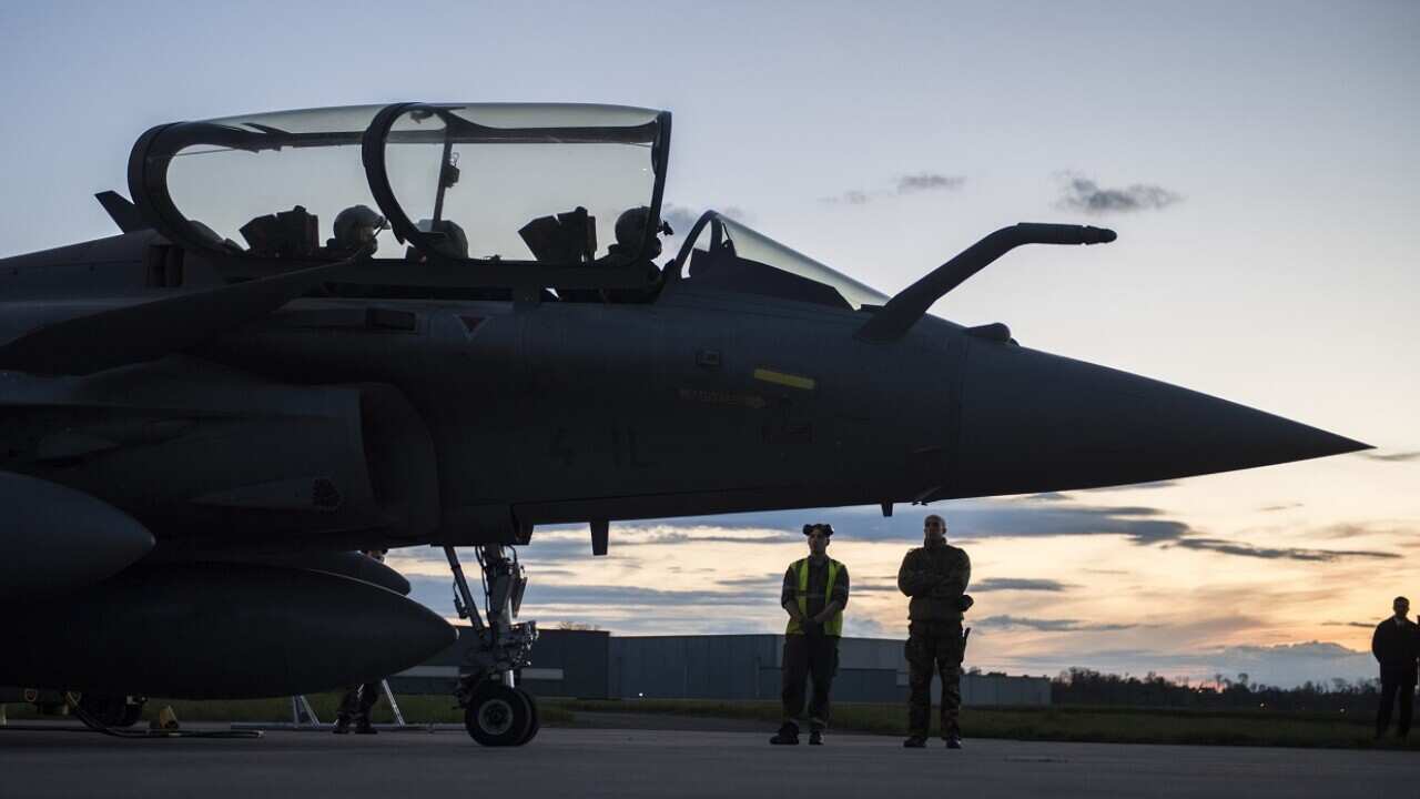 A Dassault Rafale fighter aircraft is prepared for airstrikes in Syria at Saint Dizier airbase, eastern France.
