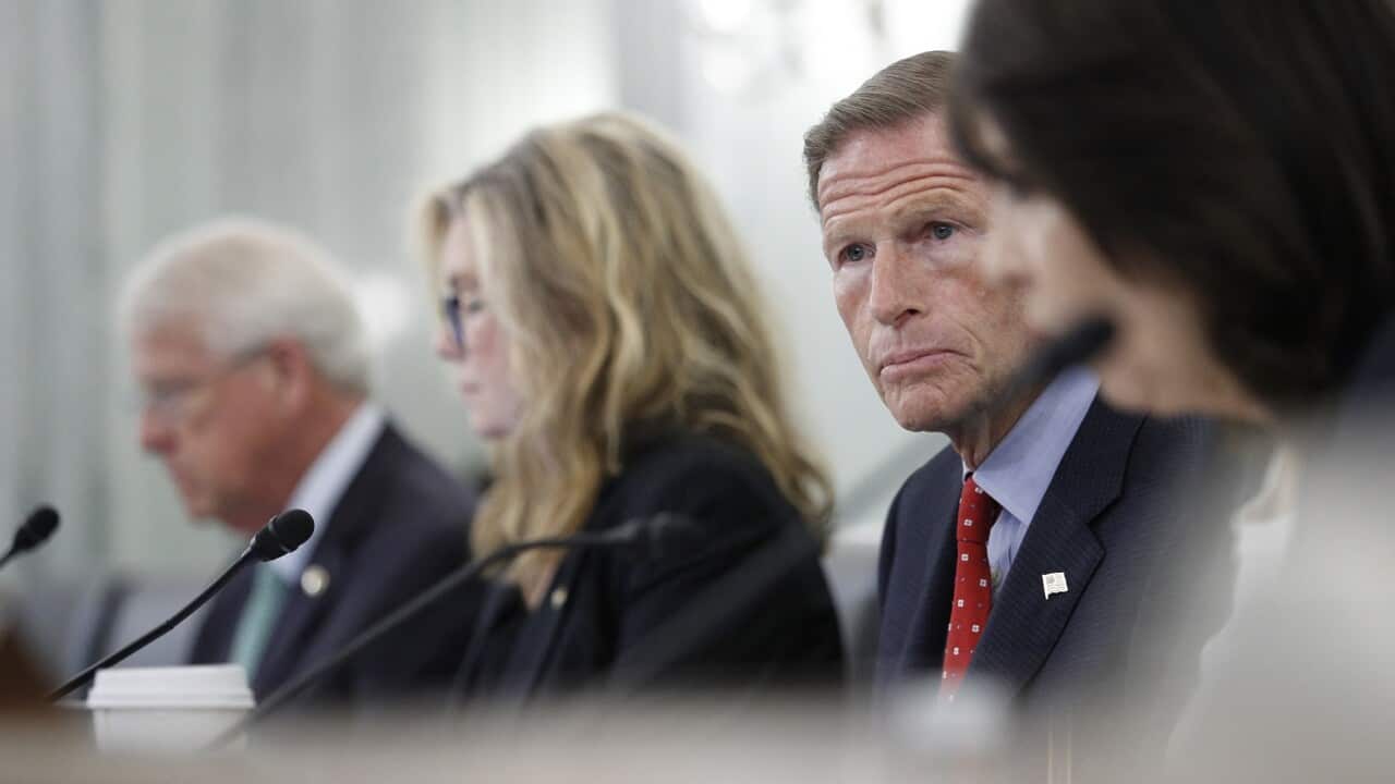 Senator Richard Blumenthal looks on as Facebook's Antigone Davis testifies before the Senate
