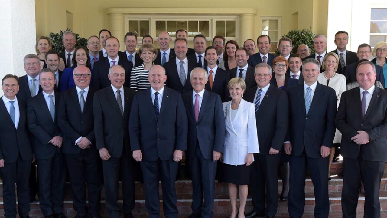 Malcolm Turnbull (C) with his newly sworn-in ministry