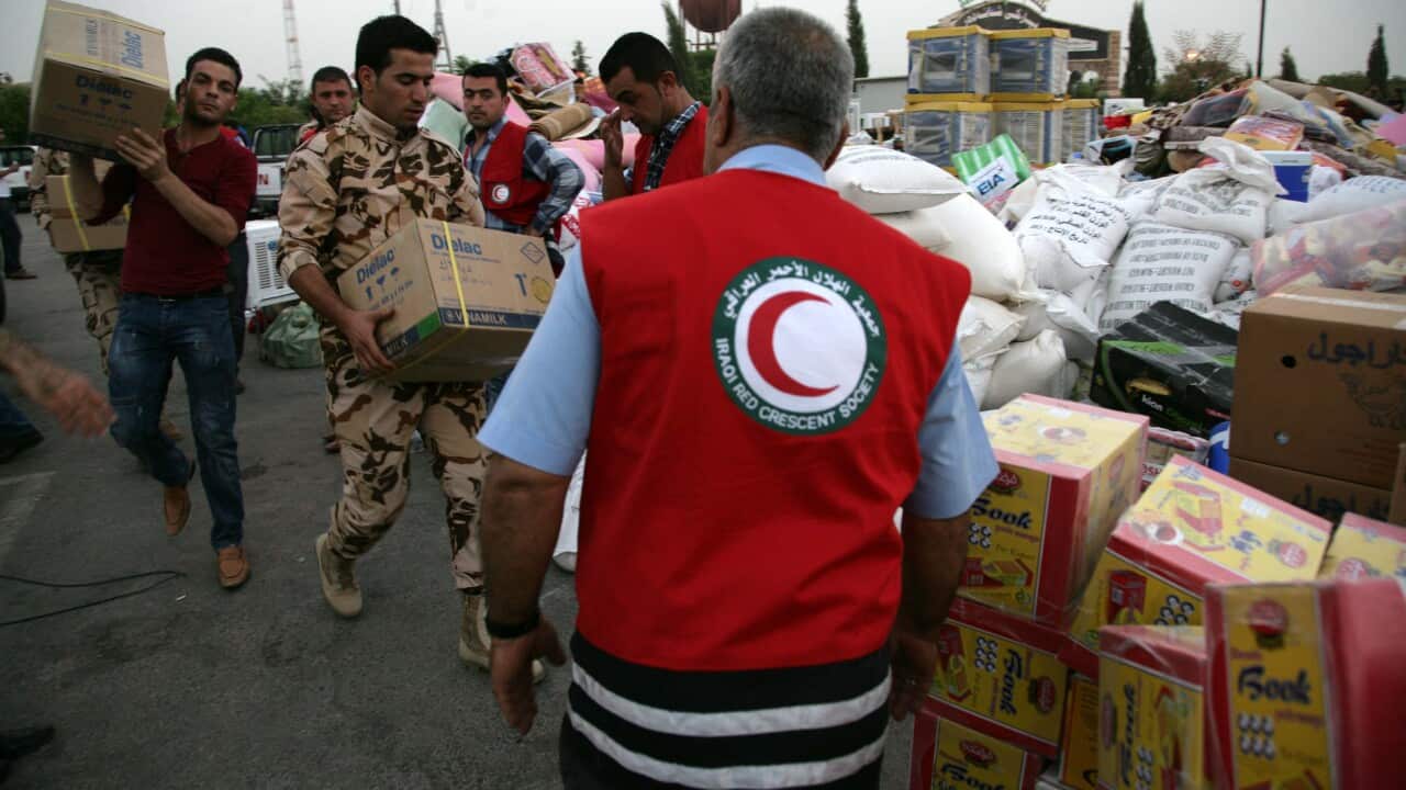 Members of the Iraqi Red Crescent Society Getty.jpg