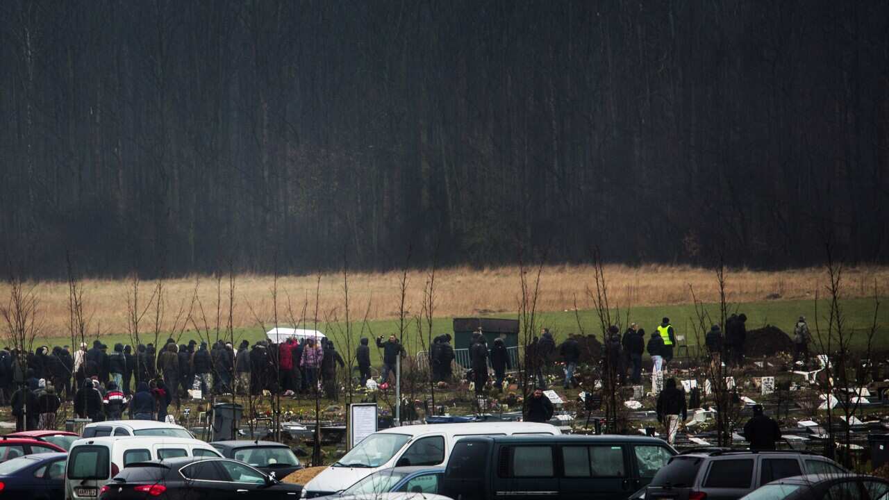 Hundreds attend funeral of Copenhagen gunman 