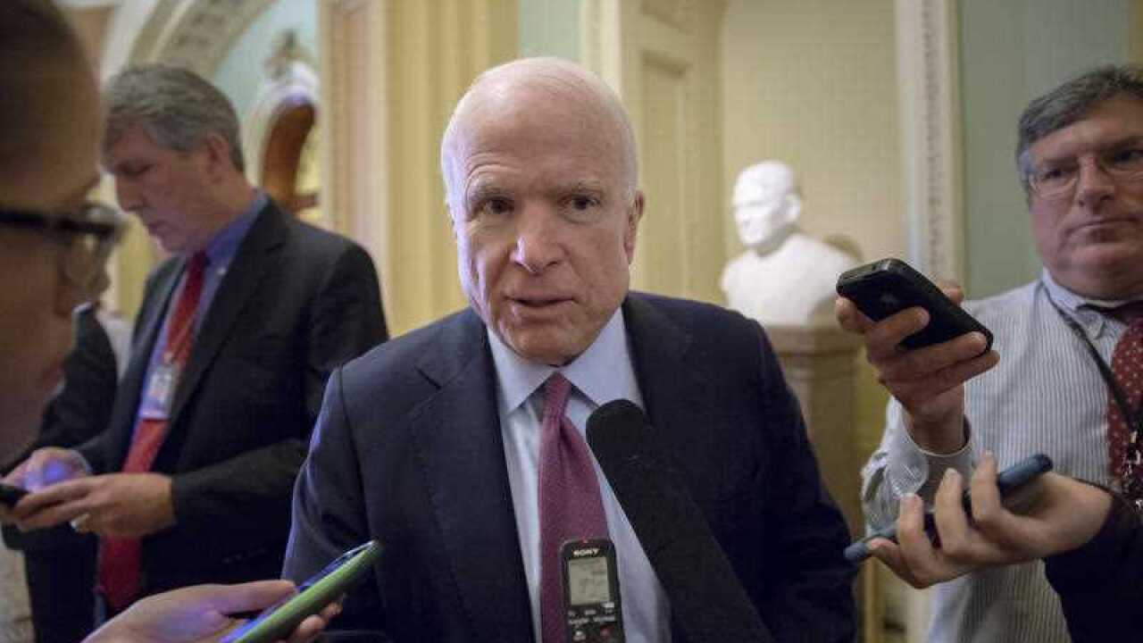 In this photo taken Tuesday, Nov. 10, 2015, Sen. John McCain, R-Ariz., speaks with reporters on Capitol Hill in Washington.