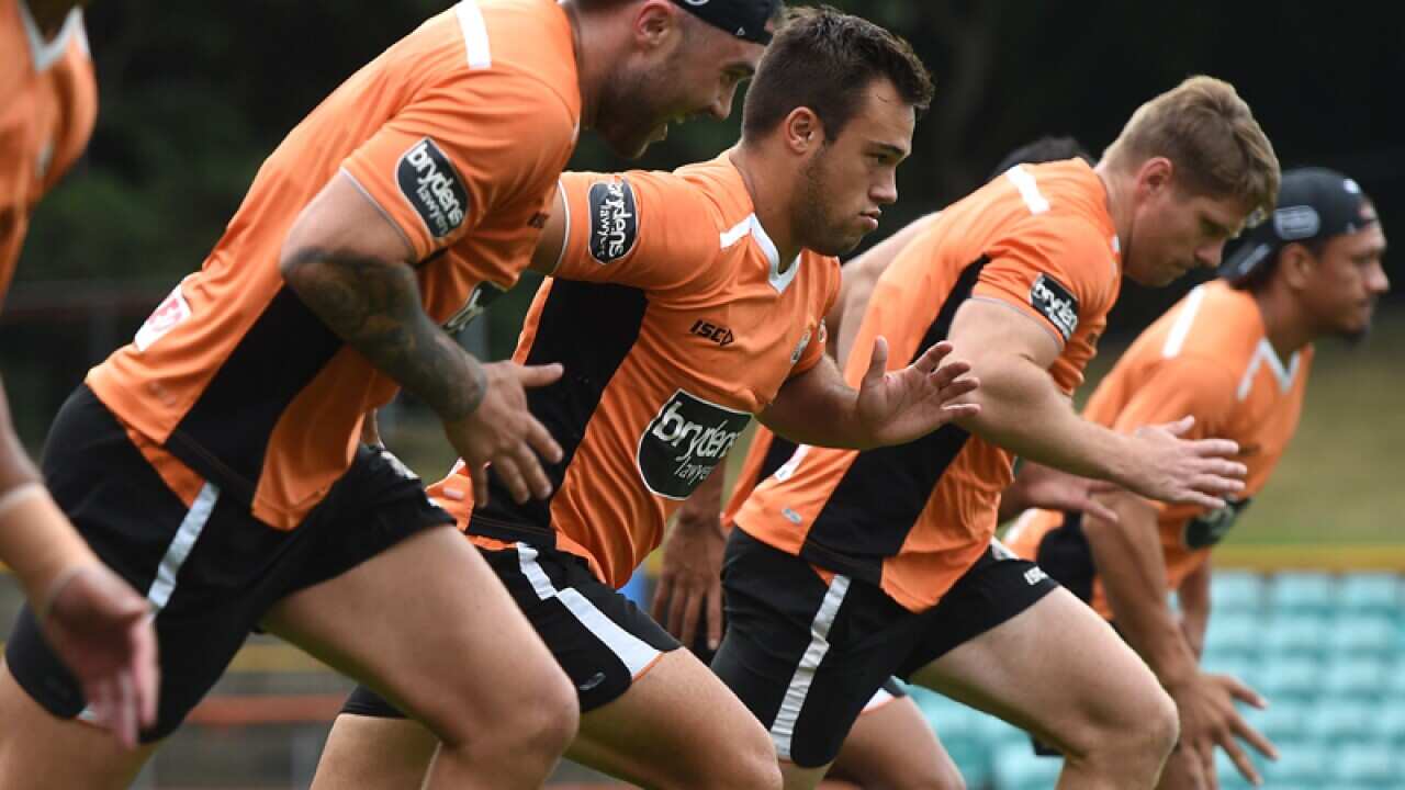 Wests Tigers player Luke Brooks participates in a drill