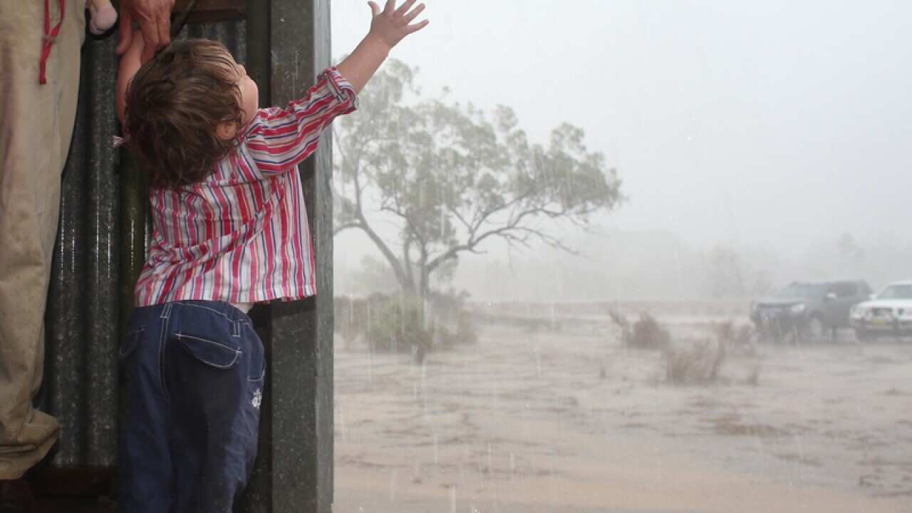 Georgina Ritchie touches rain for the first time