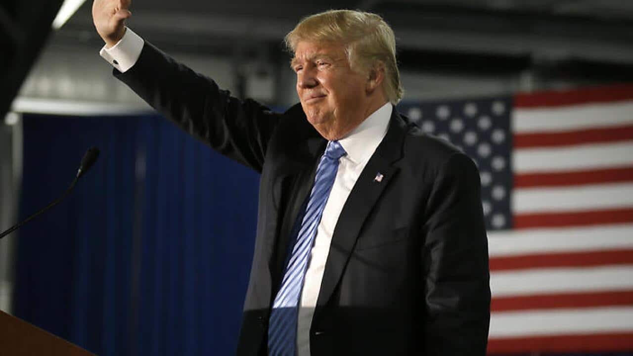 Republican presidential candidate Donald Trump speaks during a campaign rally, Saturday, Dec. 5, 2015, in Davenport, Iowa. (AP Photo/Charlie Neibergall)