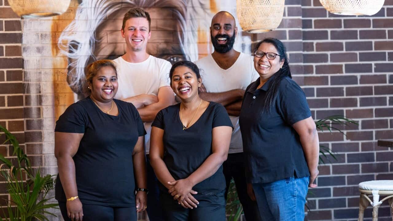 Peter Jones-Best (left) and Shaun Christie-David with some of their team from Colombo Social