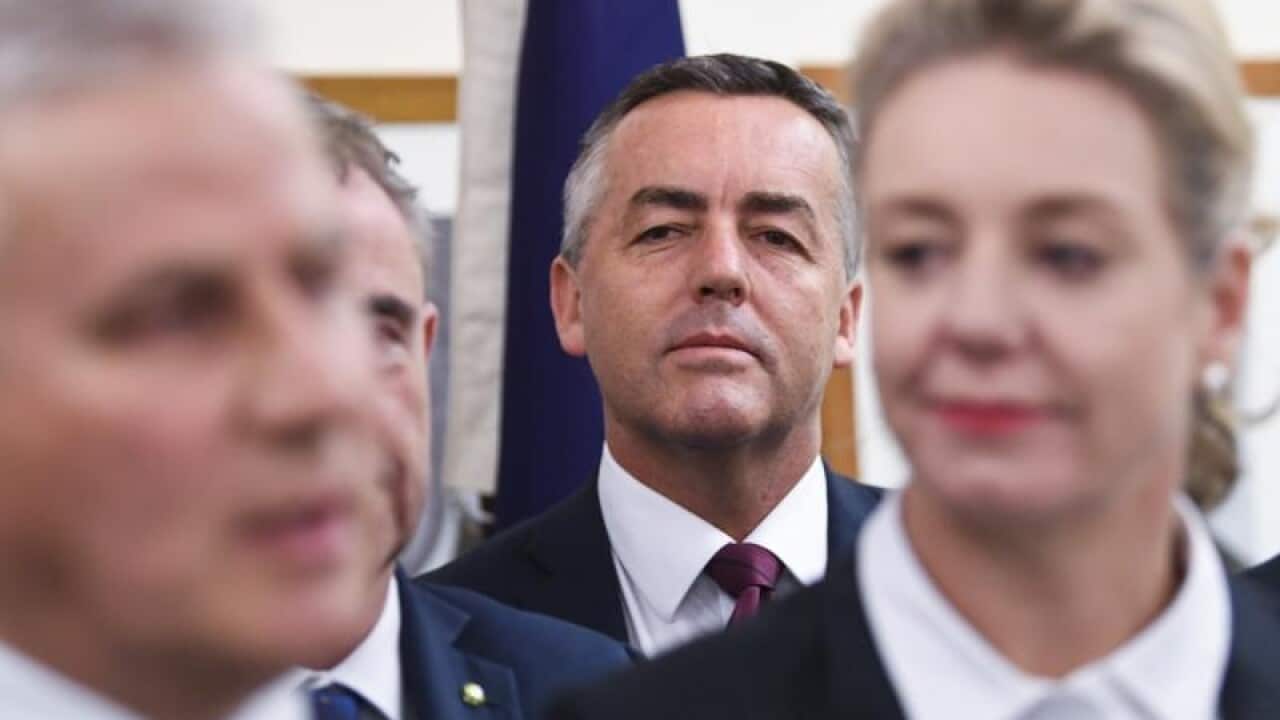 File image of Nationals MP Darren Chester behind Michael McCormack.
