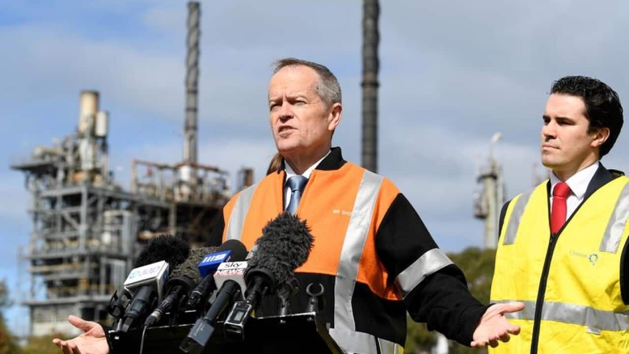Bill Shorten speaks to the media at the Qenos Altona plant.