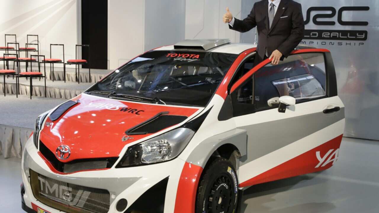 Toyota President Akio Toyoda with its Yaris WRC