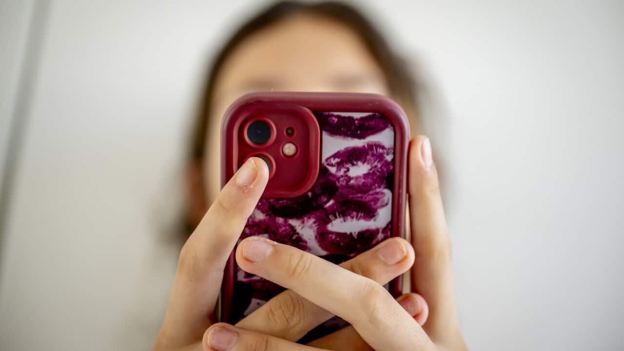 A teenage girl on her cell phone