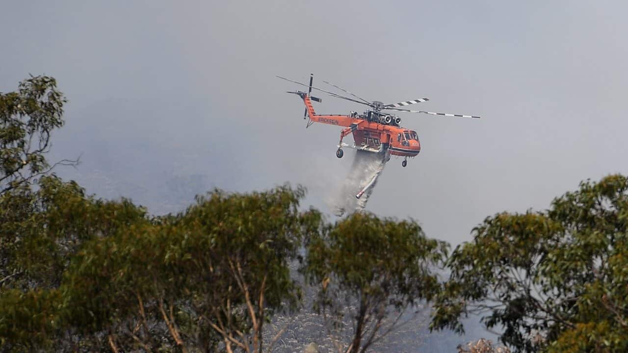 An Erickson Sky Crane fights a fire at Penrose in the NSW Southern Highlands