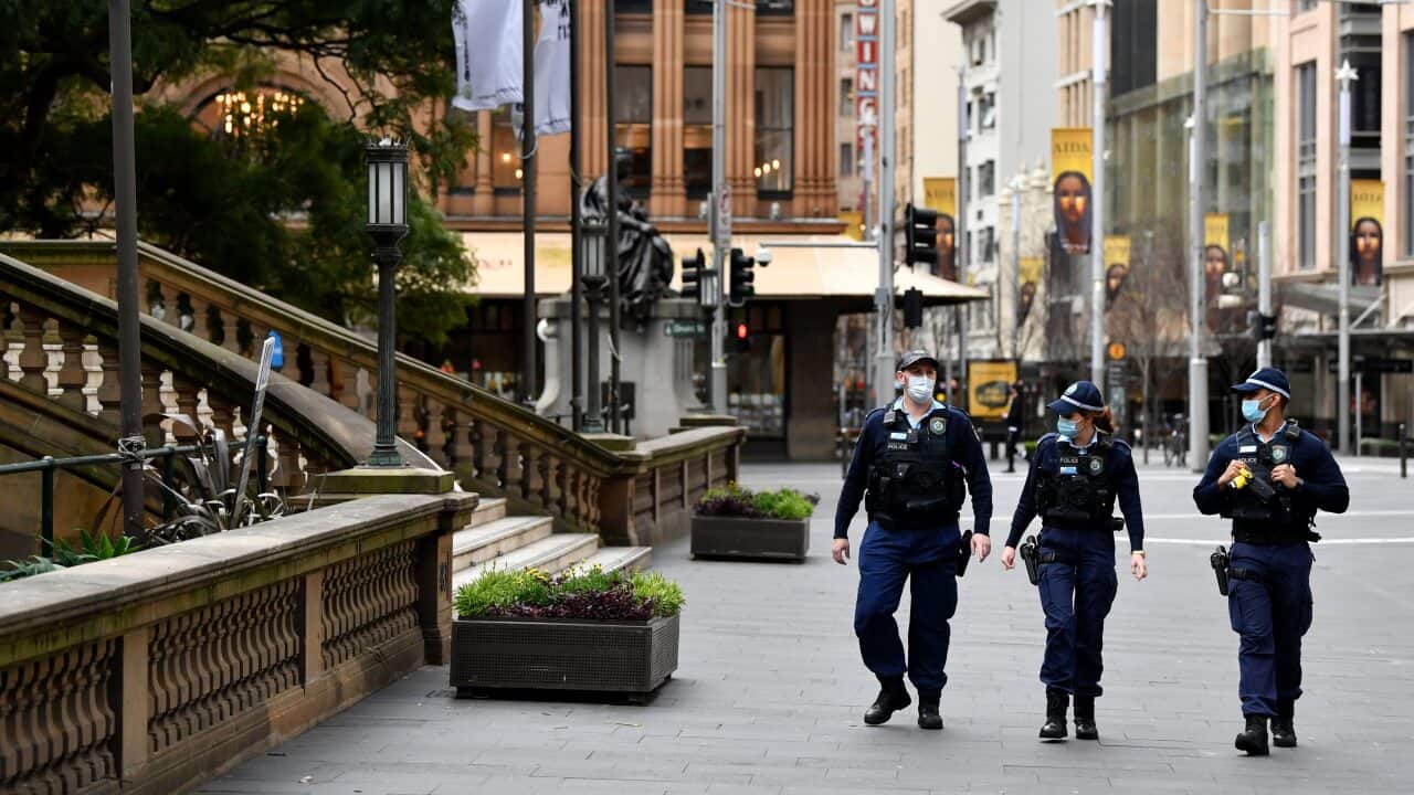 NSW Police patrol George Street in Sydney's CBD on Tuesday, 20 July, 2021.