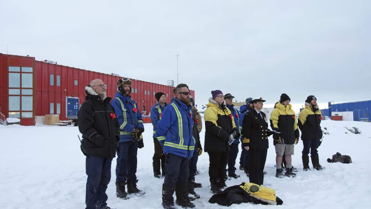 Australian Antarctic expeditioners holding an Anzac Day dawn service in sub-zero temperatures at Casey research station in 2018.