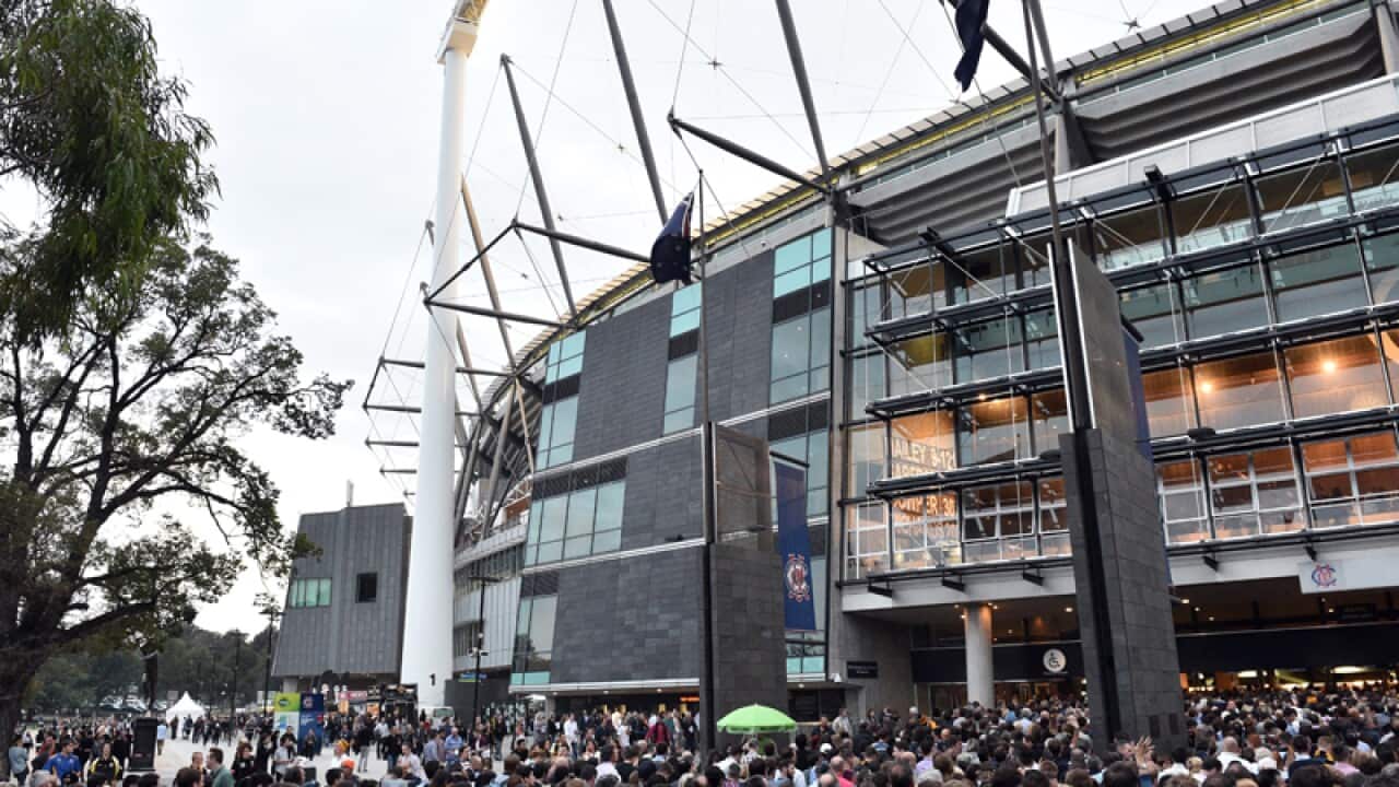 Crowds outside the Melbourne Cricket Ground