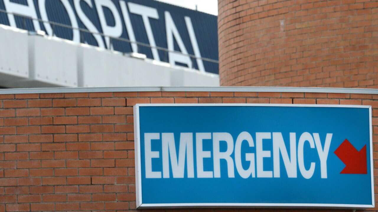 An emergency department sign at the entrance to a hospital in Brisbane