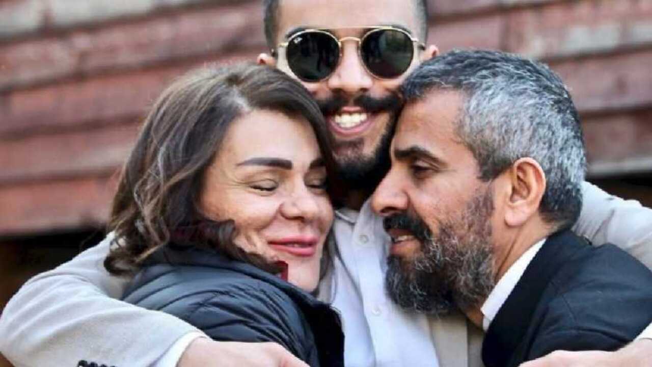 Fr Majdi and his son.jpeg