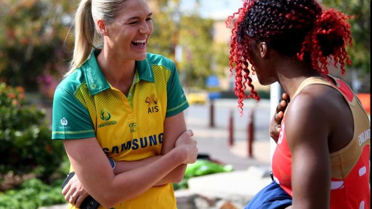 Diamonds captain Caitlin Bassett and English Roses captain Ama Agbeze