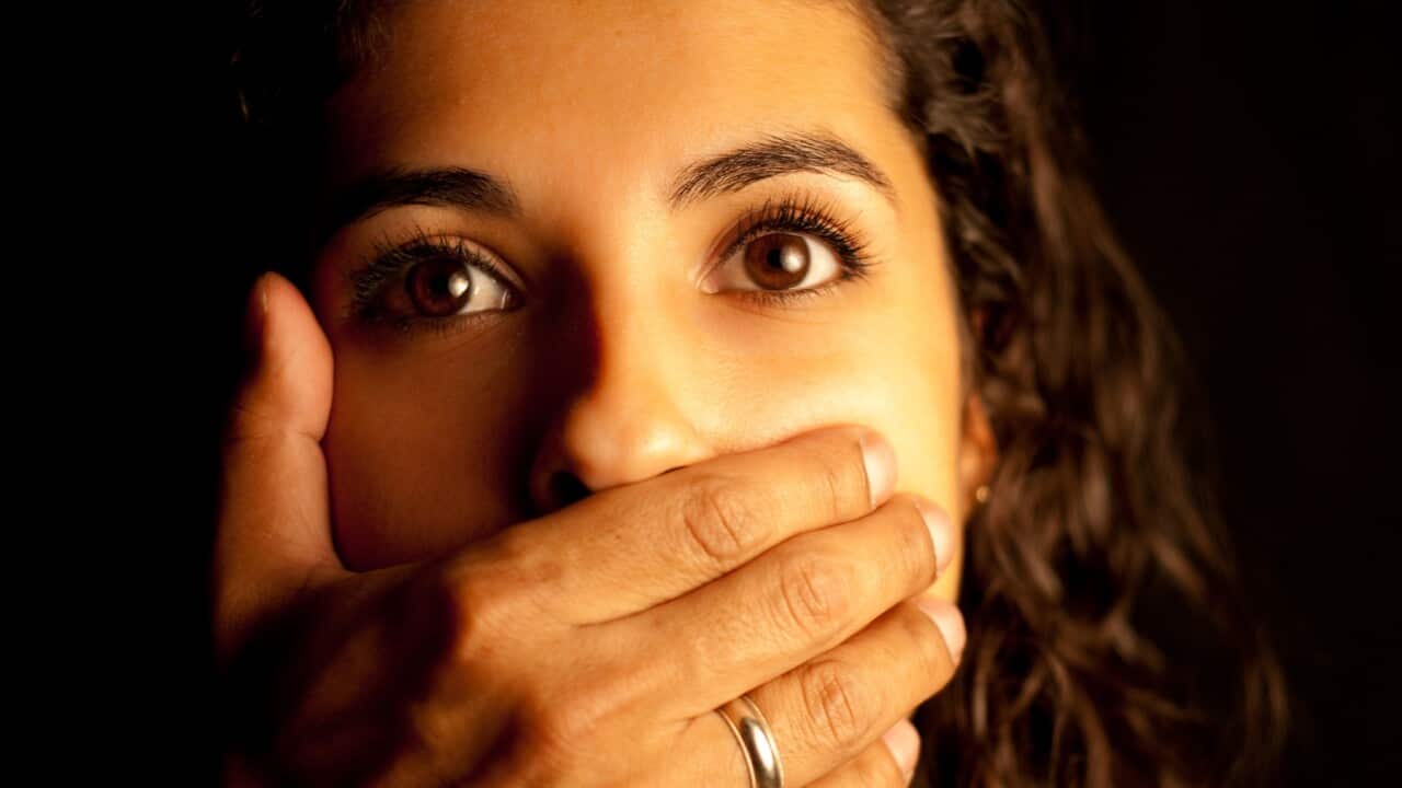 Abused Woman being silenced