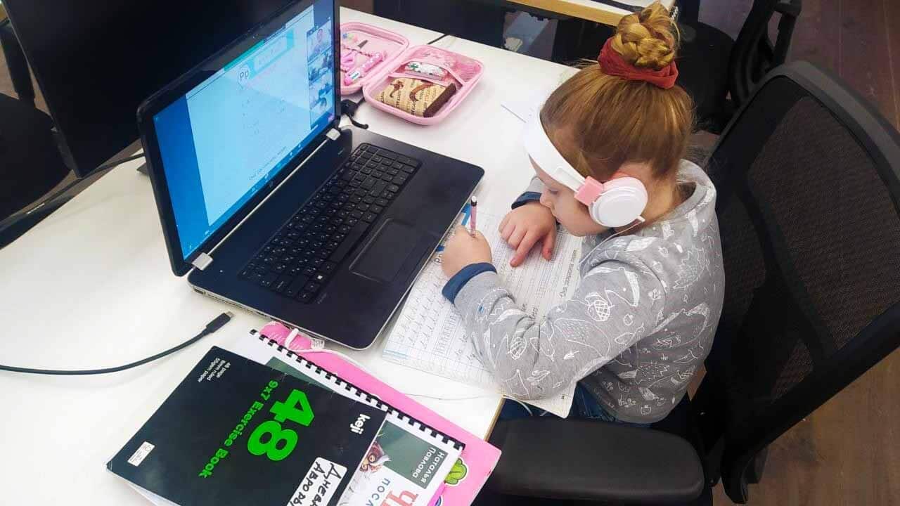 girl doing remote learning