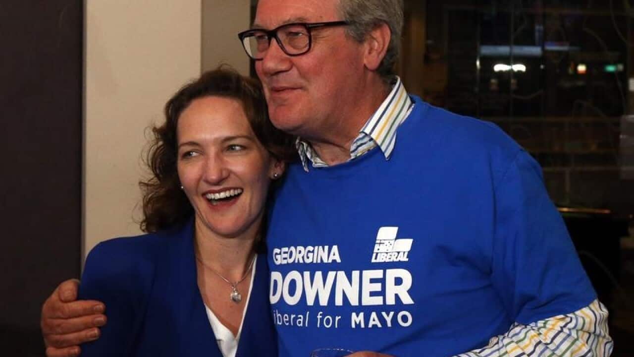 Georgina Downer, with her father Alex, after losing the by-election.
