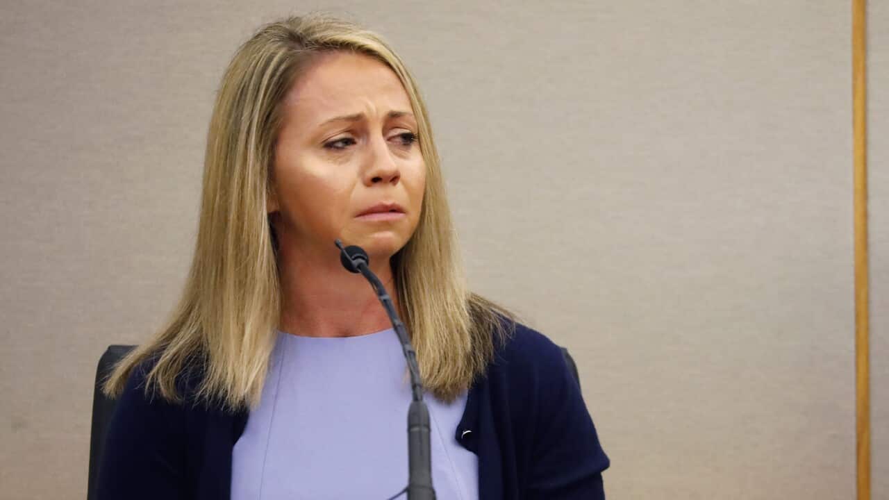 Fired Dallas police officer Amber Guyger testifying in her murder trial, Friday, Sept. 27, 2019, in Dallas.