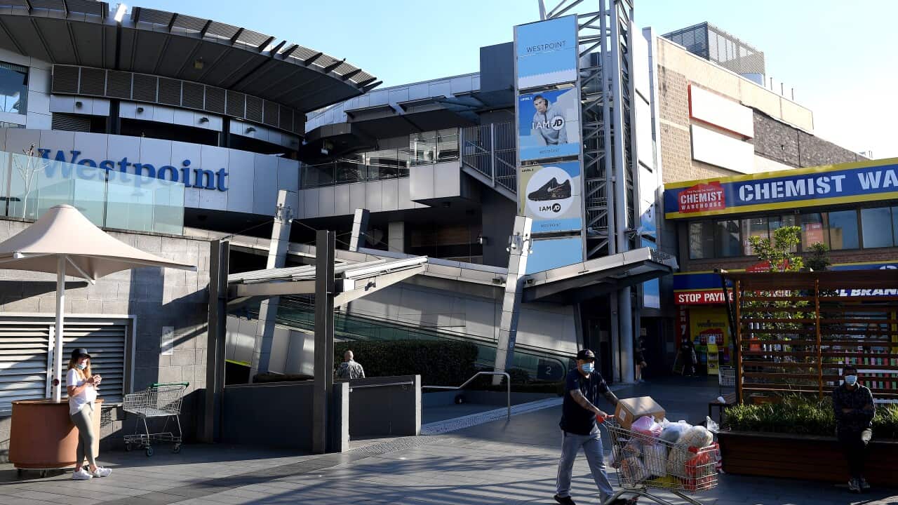 People walk in Blacktown during the lockdown last year.