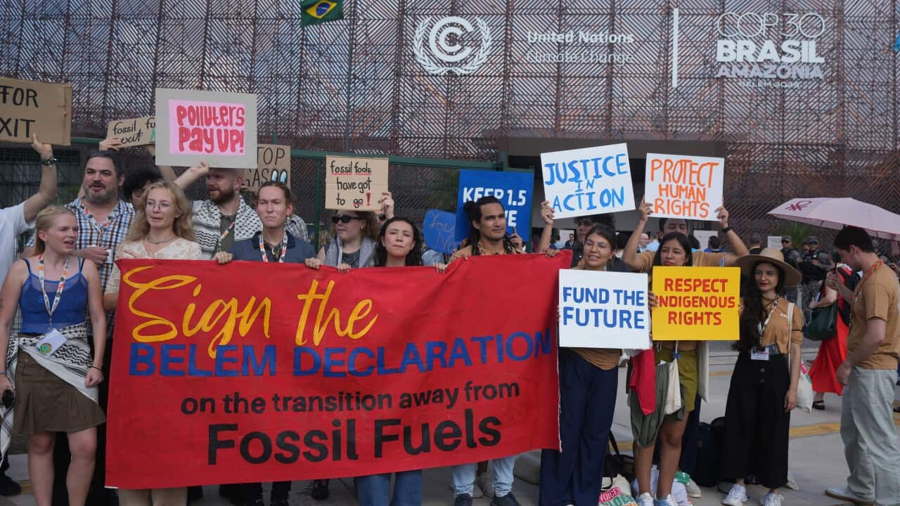 Activists participate in a demonstration to transition away from fossil fuels outside the venue for the COP30 U.N. Climate Summit, Wednesday, Nov. 19, 2025, in Belem, Brazil.