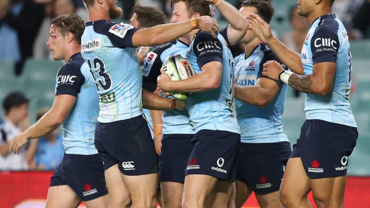 Cam Clark of the Waratahs scores during the Round 9 Super Rugby
