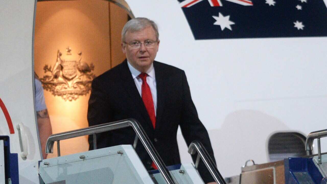 Prime Minister Kevin Rudd arrives at Fairbairn Airport in Canberra