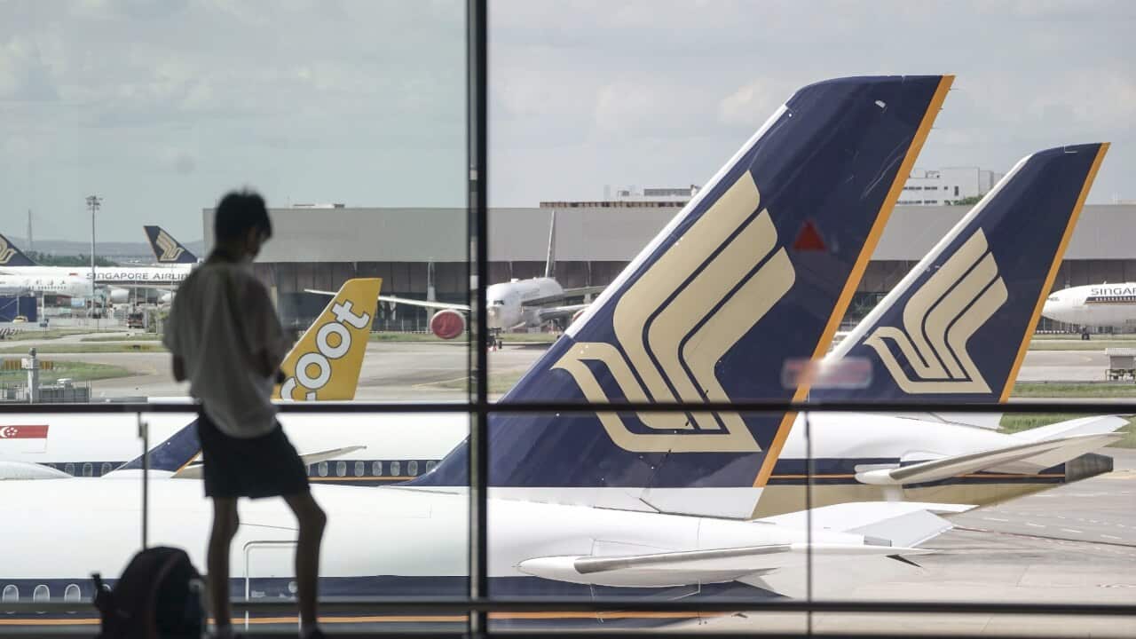 Singapore Airlines commercial jets at the Changi Airport in Singapore on 23 April 2021.