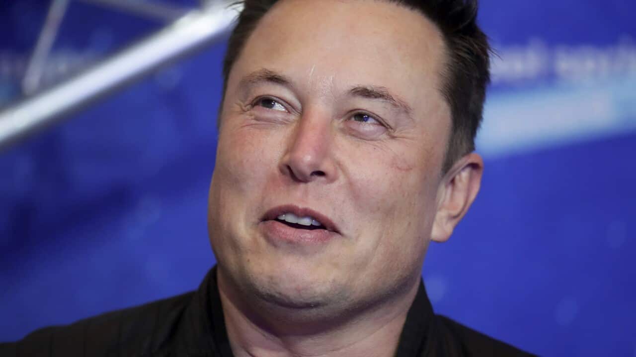 Elon Musk is seen speaking.