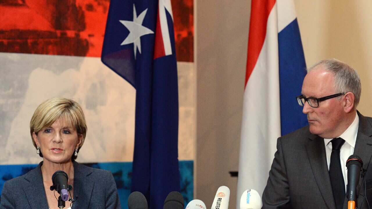 Australias' Julie Bishop (left) and Netherlands' Frans Timmermans