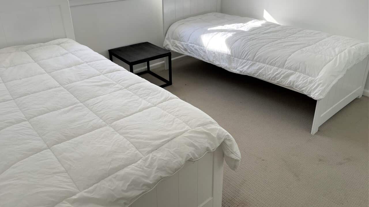 Beds in a women's shelter (SBS-Sandra Fulloon).jpg