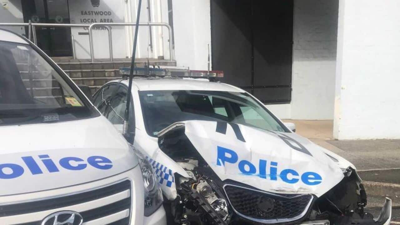 Parked police patrol vehicles was smashed by the van.