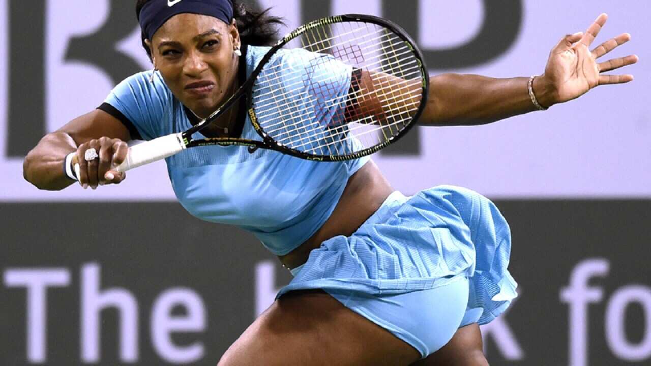 Serena Williams in action against Simona Halep