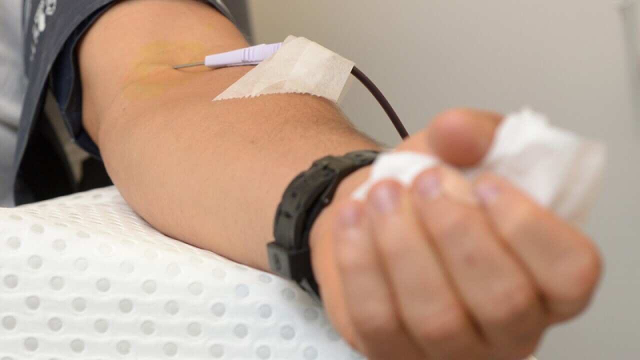 A man gives blood