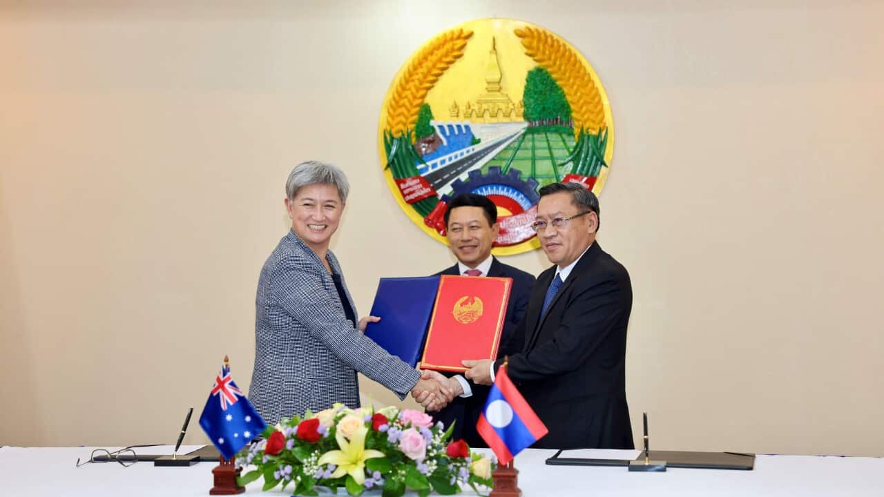 Foreign Minister Penny Wong exhanged the Laos-Australia Sustainable Energy Partnership agreement with Lao officials - DFAT.jpg