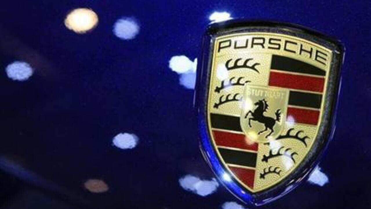 A Porsche logo is pictured on the Cayenne Diesel during the second media day of the 79th Geneva Car Show
