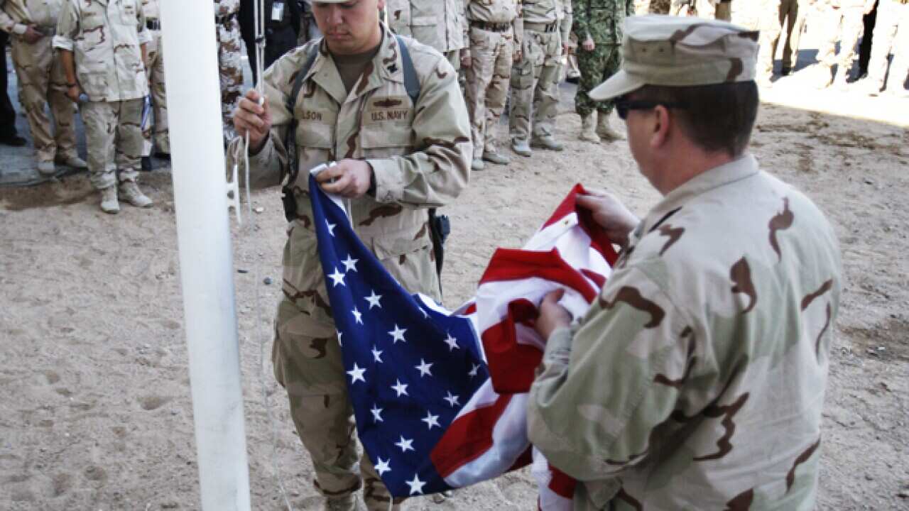 handover_basra_iraq_b_111202_ap_1532945651