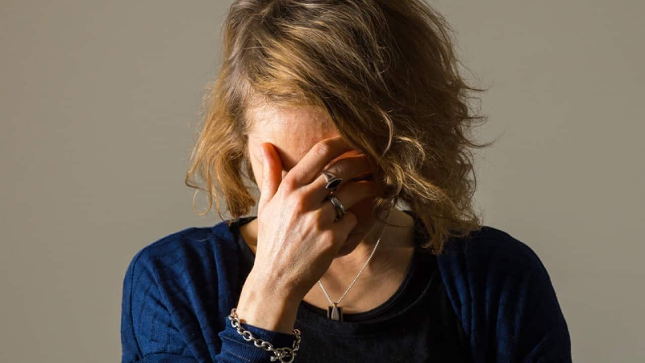 A woman showing signs of depression