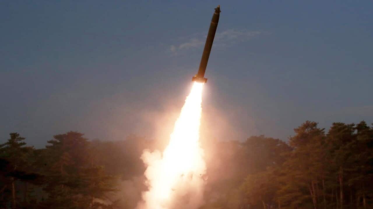 A photo released by the official North Korean Central News Agency (KCNA) shows a separate missile launch on March 10.