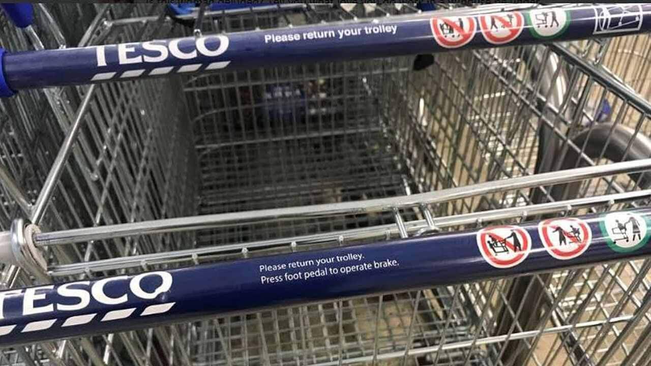 Opinion is divided over whether stickers on supermarket trolleys depicting women are sexist.